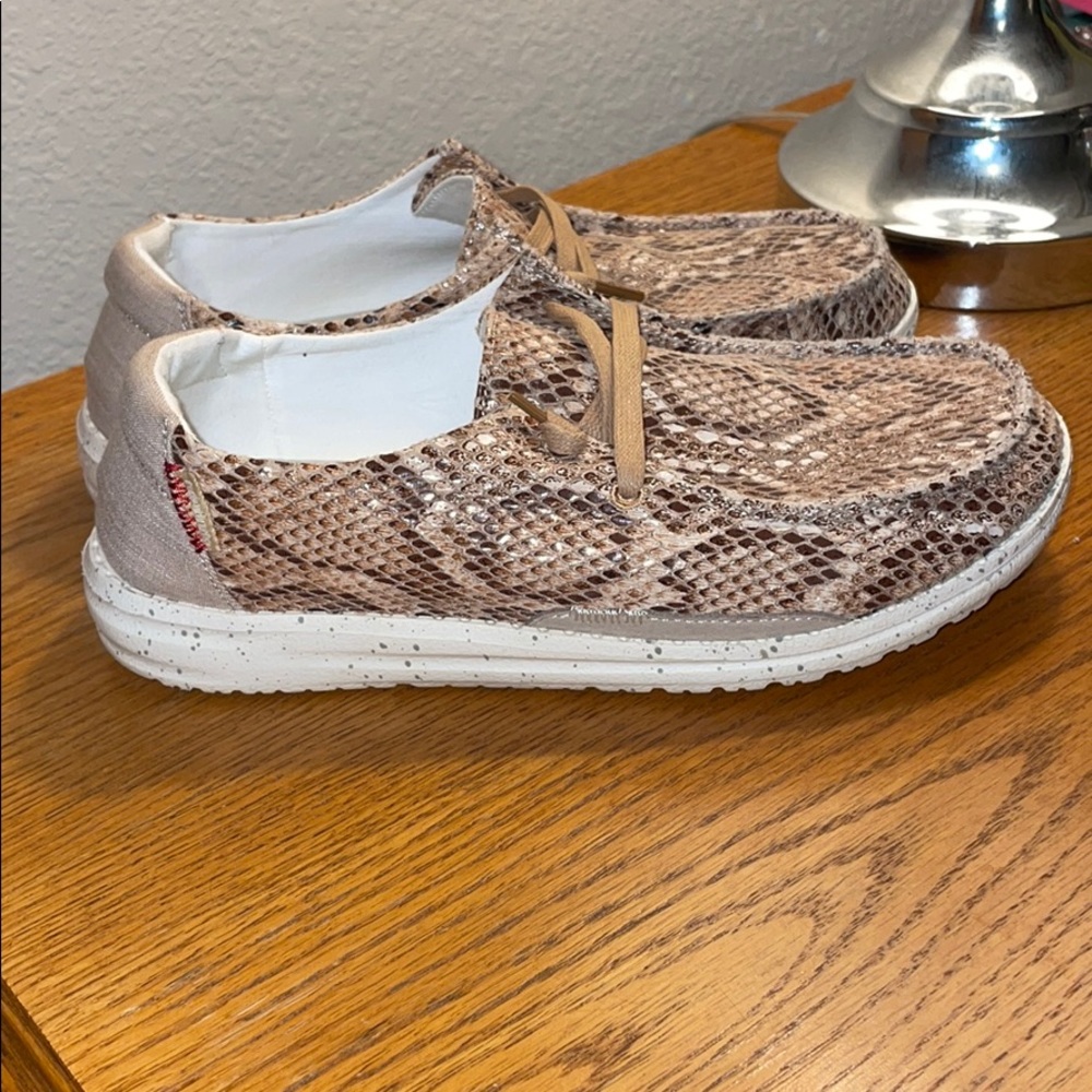 Brand new women’s 7 hey dude snake skin shoes